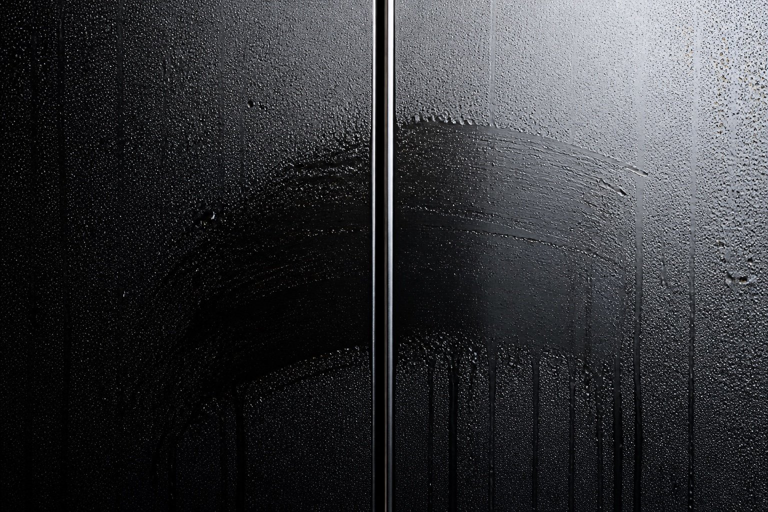 Split black mirror seam with a condensation wipe